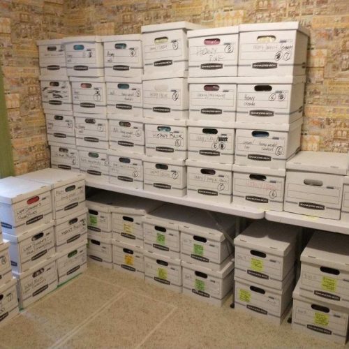 A room of packed boxes is ready for a residential move - an organized life, boston, ma