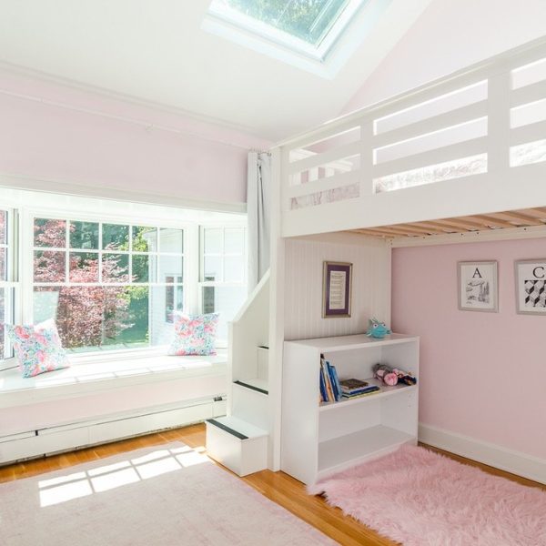 Achild's bedroom has a bunk bed and a study area underneath - an organized life, ma
